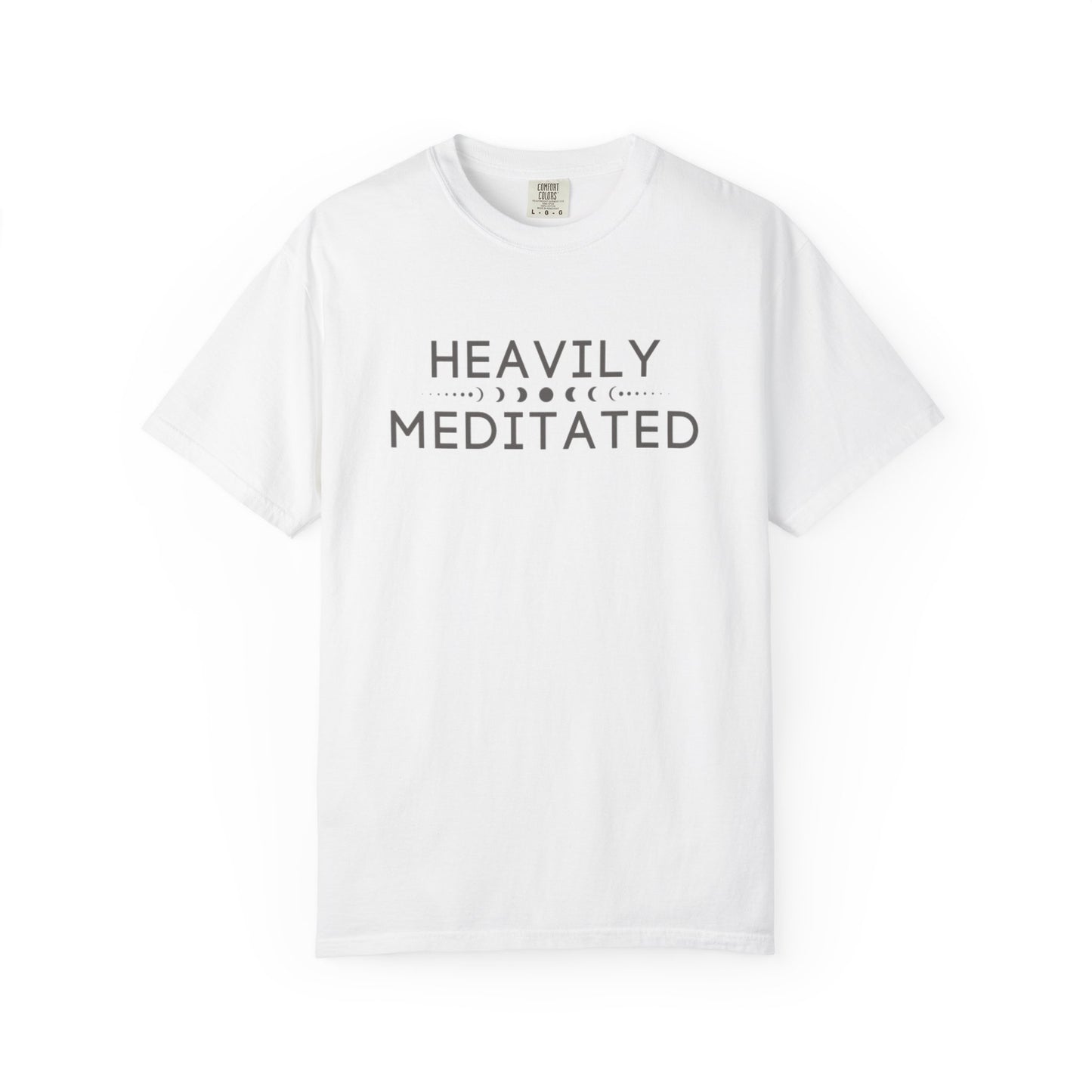 White t-shirt with 'HEAVILY MEDITATED' text on a white background