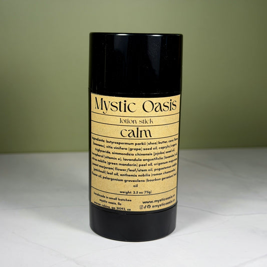 Mystic Oasis lotion stick labeled 'calm' on a white surface with a green background
