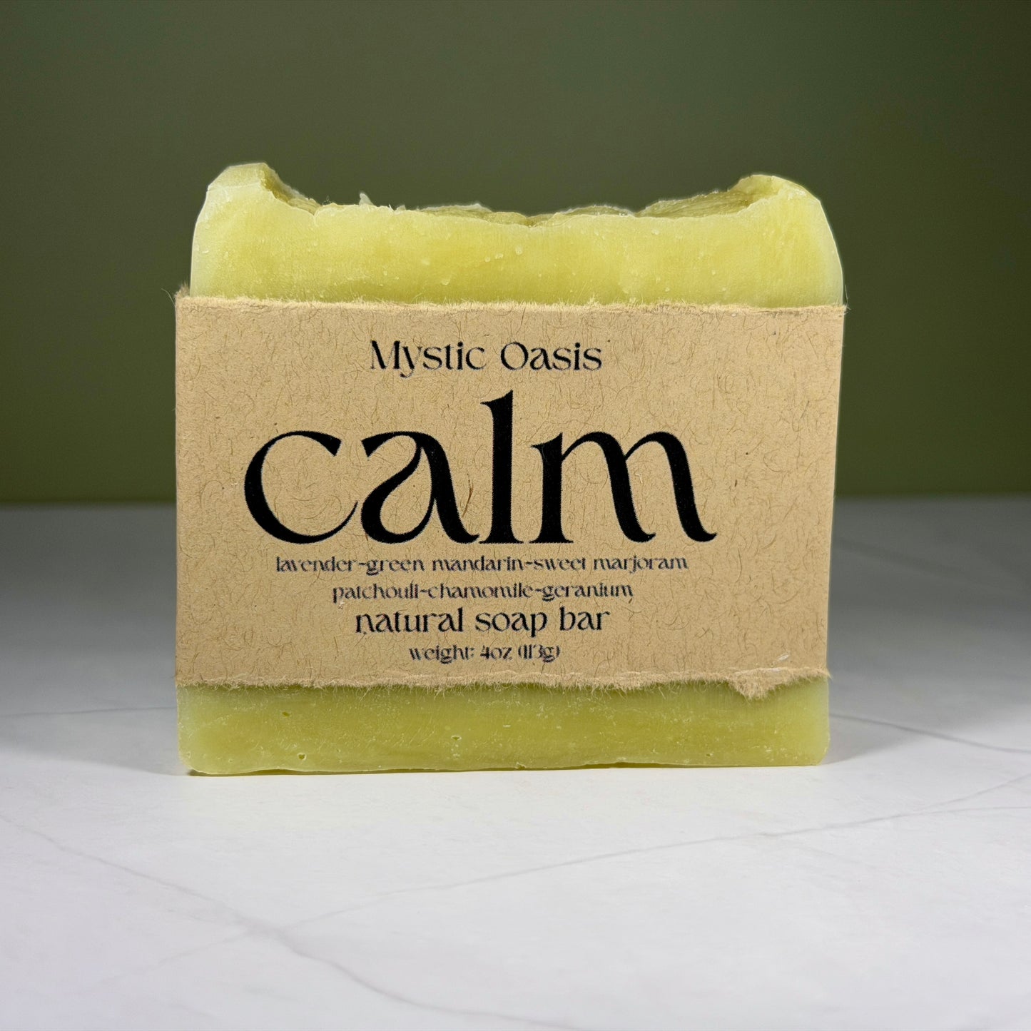 soap bar with 'Mystic Oasis Calm' packaging on a white background