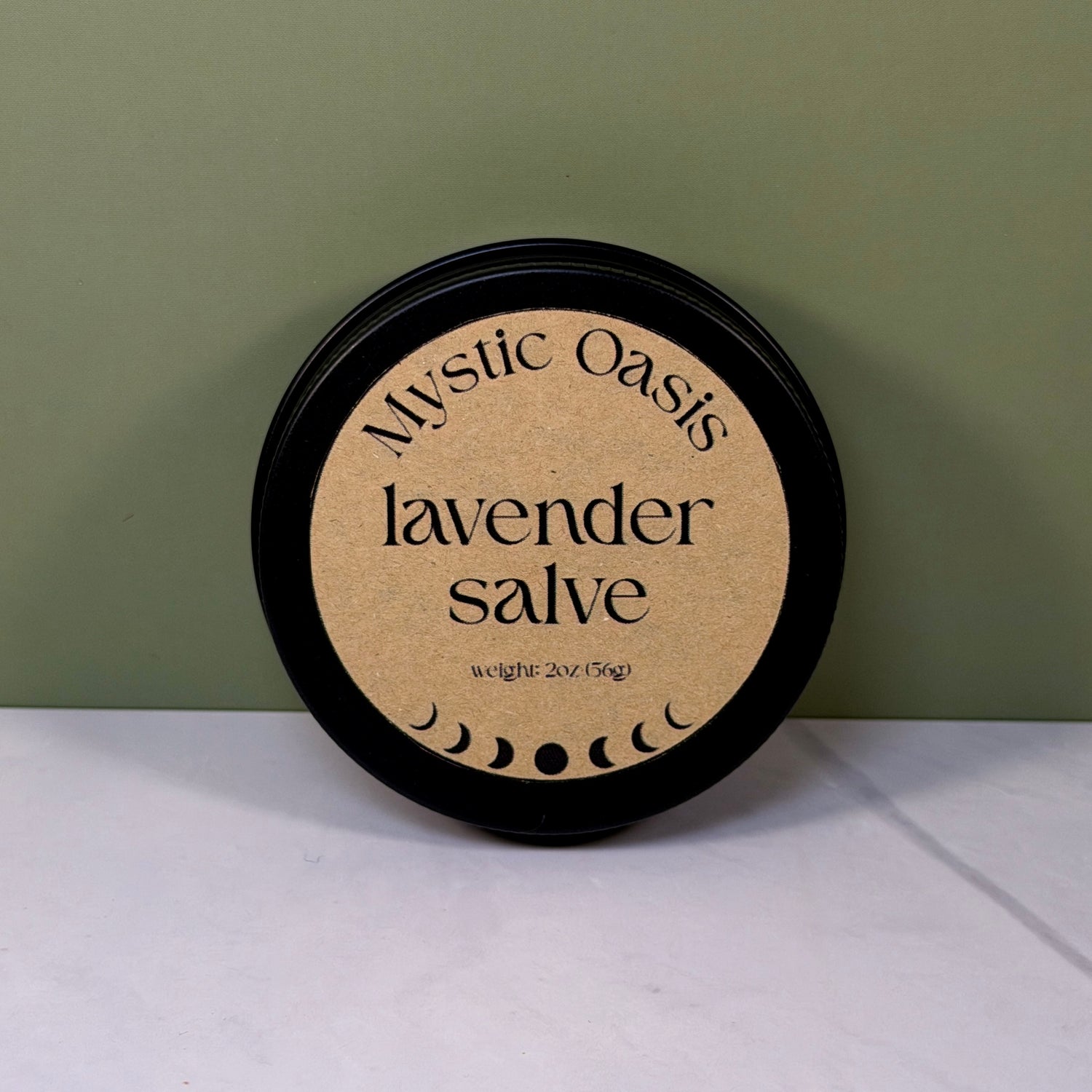 Small tin labeled “lavender salve” 