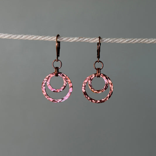 Copper earrings with a large hoop and a smaller hoop